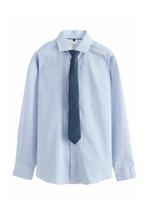 Helesinine pika varrukaga puuvillane särk, millel on klassikaline krae ja tumesinine lips valgete täppidega, nupuga esikülg ja mansetid.