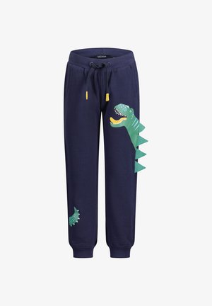 Pantalon de survêtement bleu marine pour enfants avec imprimé tête et queue de dinosaure verte et taille à cordon avec embouts jaunes.