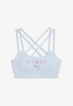 Reggiseno sportivo azzurro chiaro con spalline incrociate e scritta rosa "HYROX" e logo Puma sul davanti.