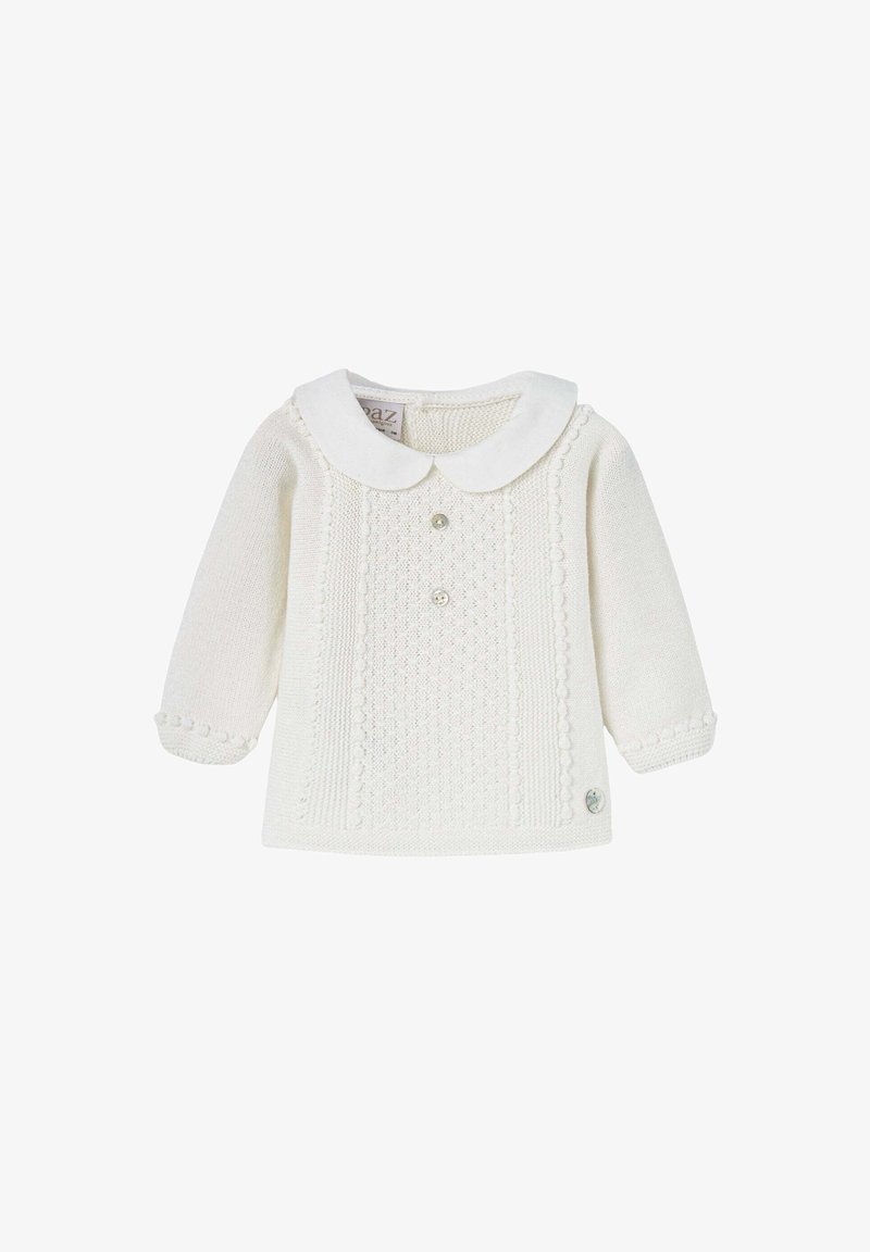 Pull en maille blanche avec un col claudine, des boutons décoratifs et des motifs texturés sur le devant. Manches longues avec des accents de boutons.