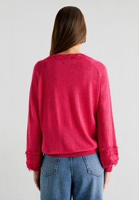 Scalpers Neule - raspberry