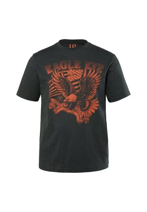 Sort bomulds T-shirt med korte ærmer, der har et stort orange ørne grafik. Teksten lyder "ØRNENS ØJE" ovenfor og "FRIHED FRA FRYGT" nedenfor.