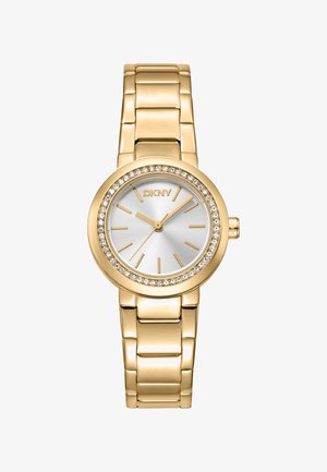 Gouden DKNY-horloge met een zilveren wijzerplaat, kristalversieringen en een schakelen armband. Kenmerkt zich door minimalistische uurmarkers en een ronde kast.