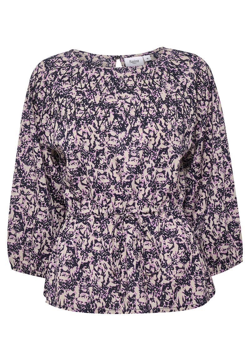 Blouse abstraite à fleurs violettes et rose clair avec de longues manches bouffantes et un détail de taille à cordon.