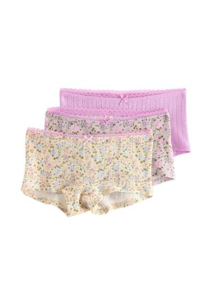 Tre par dame-bukser i pastelrosa og blomsterprint, hver med blondestrimle og lille sløjfedetalje ved taljebåndet.
