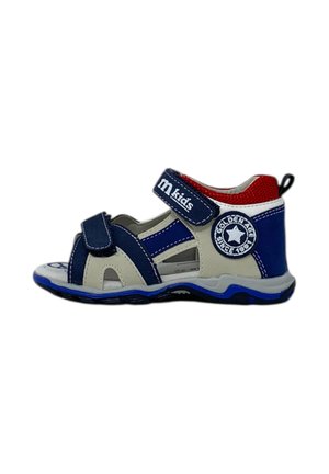 Sandalo blu e bianco con tacco chiuso, punta aperta e cinturino in velcro. Presenta un'etichetta rotonda sul lato e una suola testurizzata.