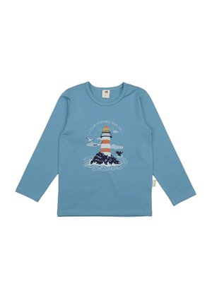 Long-sleeve blue cotton t-shirt featuring a lighthouse and ocean graphic in white and dark blue, with a crew neckline and tag on the side.
