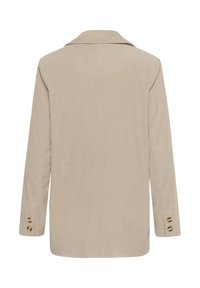 Beige corduroy bleiseri pitkähihaisilla hihoilla, viistetty kaulus ja kultanapilla varustetut hihat. Sujuva pinta ja istuva malli.