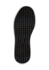 Suela de zapato de goma negra con un patrón texturizado de panal, borde blanco y un logotipo en el centro. Diseño de parte inferior plana.