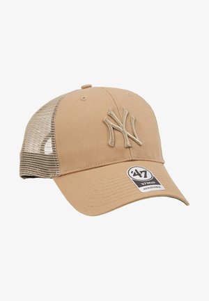 Beige-baseballhatt med böjd skärm och meshsidor. Har broderad NY-logotyp och justerbar snapback-stängning.