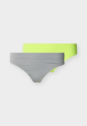 Zwei nahtlose Bikini-Slips für Damen, einer vorne grau und einer hinten neon-gelb, auf weißem Hintergrund präsentiert.