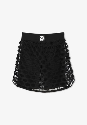 Jupe noire avec un design original en découpes et des motifs ovales, une taille élastique et un accent logo. Fabriquée en tissu extensible.