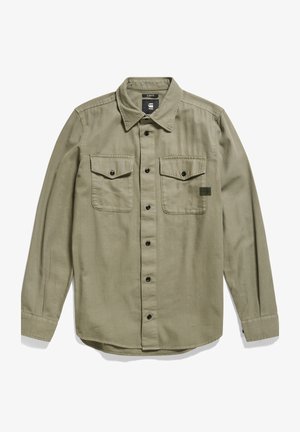 Olive green long-sleeve shirt with a slim fit, button-down front, two chest pockets with flaps, and black buttons. Soft fabric texture.