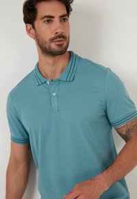 Buratti SLIM FIT - Polokošeľa - light blue