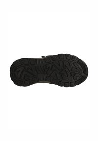 Semelle de chaussure en caoutchouc noire avec un motif texturé de rainures et de bandes, conçue pour l'adhérence et la durabilité.