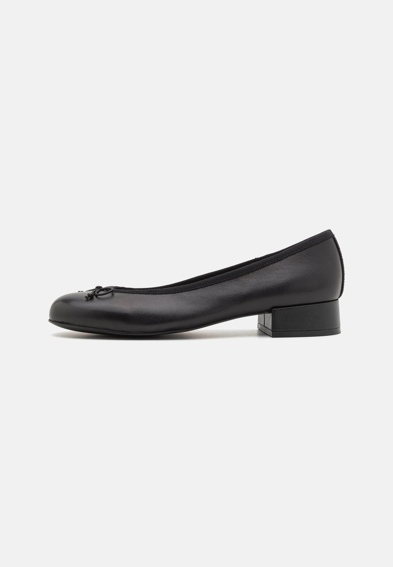 Black leather ballet flats with a small rectangular heel, rounded toe, decorative bow detail, and elastic trim at the opening.