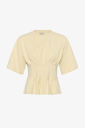 Hele kollane lühikeste varrukatega pluus, millel on kogutud vöökoht ja volditud ääreosa, ümmargune kaelus ning väikese brändisildiga krae sees.