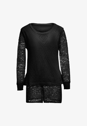 Fekete pulóver textúrált kötött testévéssel és csipkés hosszú ujjal. Kerek nyakkivágással és lazán ültetett fazonnal rendelkezik, amelyet mintás dizájn tesz hangsúlyossá.