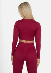 SQUATPROOF LONG SLEEVE NO SURRENDER SEAMLESS   - Sweater met rits - wine