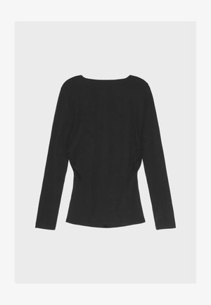 Mustast pikast varrukast särgist, mis on valmistatud pehmest materjalist, ümmarguse kaelusega ja külgedel volangidega. Sile tekstuur, kehasse söandav disain.