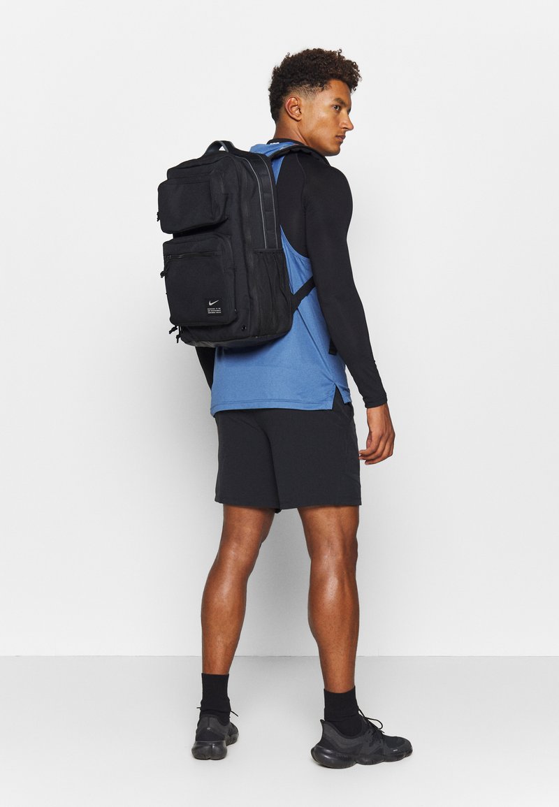 Nike Performance UTILITY SPEED BACKPACK UNISEX - Rucksack - black/enigma stone