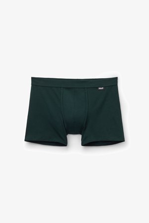 Mørkegrønne bomulds-boxershorts med en blød tekstur, der har en tætsiddende pasform og et lille sort mærkat på kanten. Ingen synlige mønstre.
