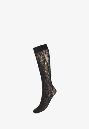 Chaussettes noires montantes avec un design en maille géométrique, un motif texturé et une bande noire unie en haut.