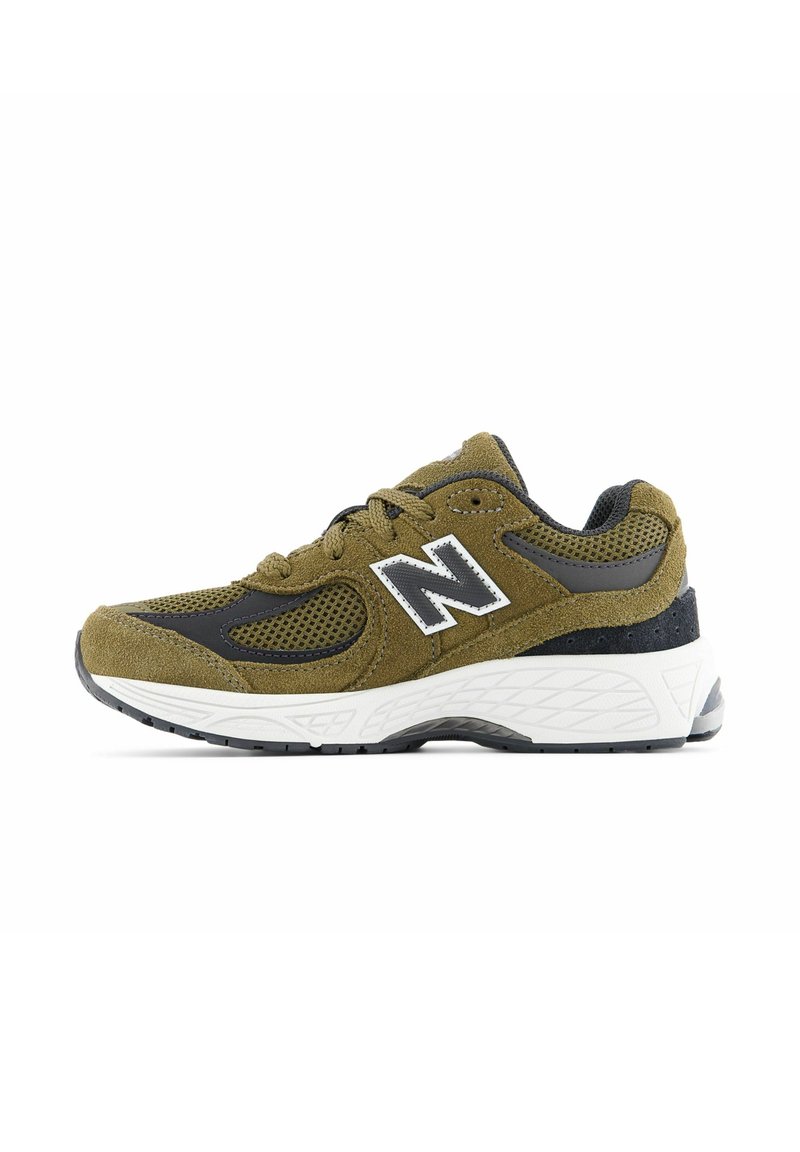 Athletic shoes in olive green suede with black mesh accents, white midsole, and textured rubber outsole. Silver logo on the side.