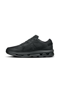 Zwarte sportieve schoen met een bovenwerk van mesh, ronde teen, gevoerde kraag en een gevoerde zool met zichtbare uitsparingen voor ventilatie.