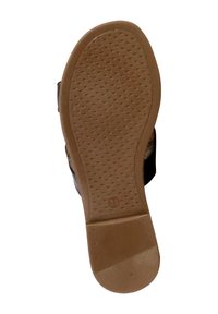 Sandaal zool, rubbermateriaal, lichtbruine kleur, textuur met kleine stippen, vlak ontwerp en zachte rand; maat gemarkeerd als 36.