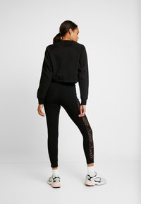 Urban Classics LADIES SHORT RAGLAN CREW - Sweatshirt - black