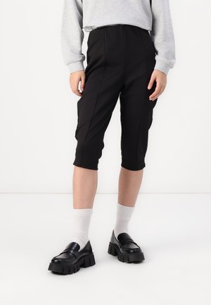 SIMONSE CAPRI  - Šorti - black