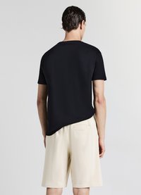 Calliope GINNICO - Pantaloni sportivi - beige chiaro