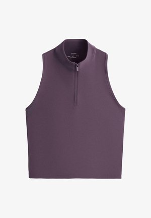 Haut sans manches violet avec un col haut et une demi-fermeture éclair à l'avant, en tissu lisse, posé à plat sur un fond blanc.
