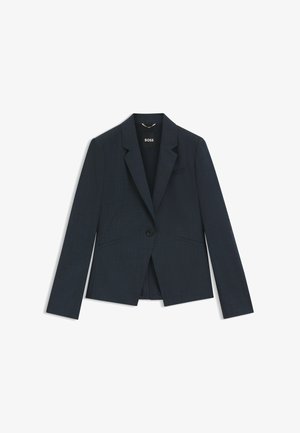 Blazer blu navy scuro con rever a lancia, chiusura con un bottone singolo e due tasche frontali. Realizzato in tessuto strutturato, vestibilità sartoriale.