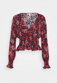 Schwarze Bluse mit langen Ärmeln, mit gesmoktem Bund, roten und rosa Blumenmustern und gerafften Ärmelsäumen.