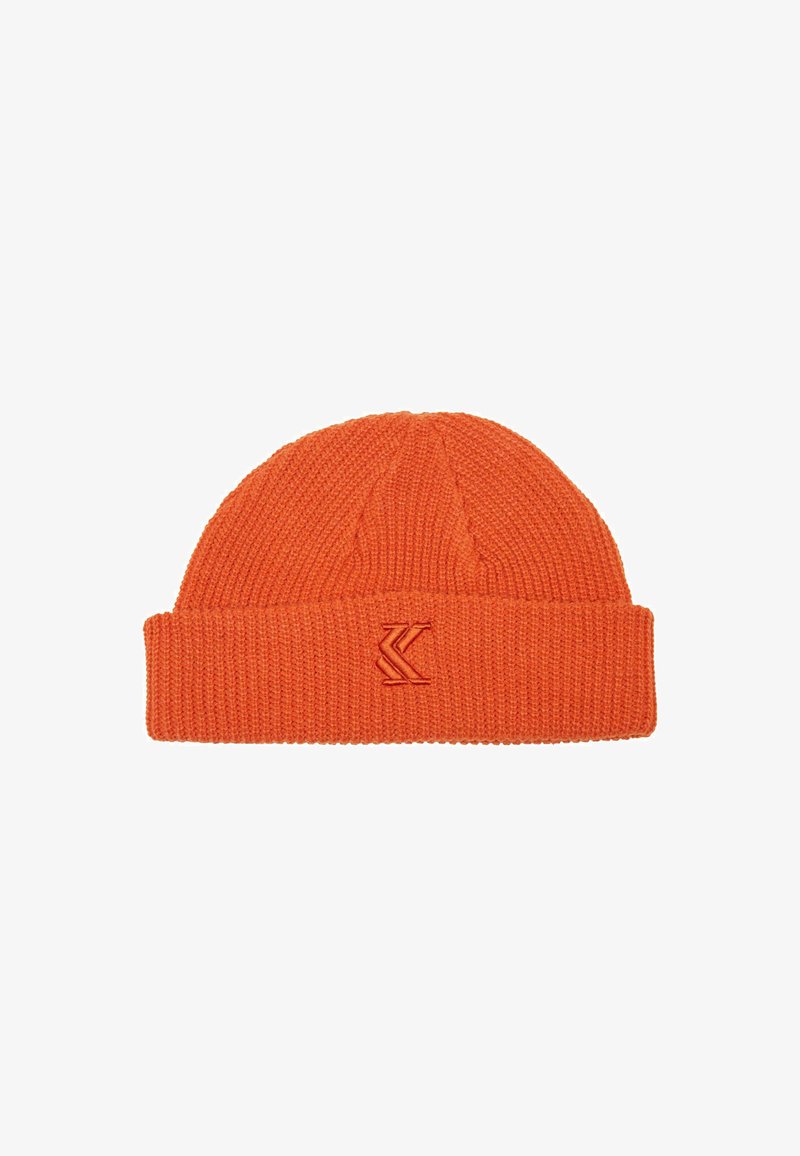 Orange knitted beanie with a ribbed texture, featuring a folded cuff and an embroidered logo on the front.