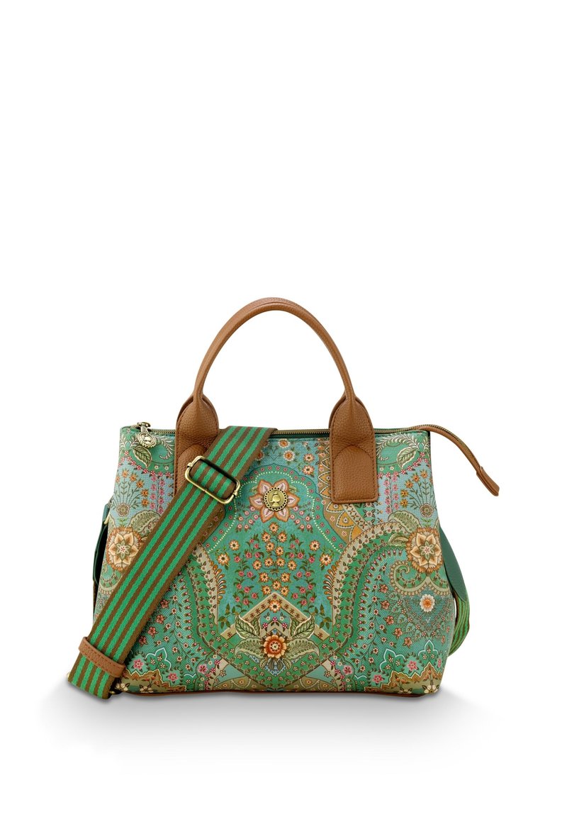 Green patterned handbag with floral designs, brown leather accents, dual handles, and a detachable striped strap. Zipper closure at the top.