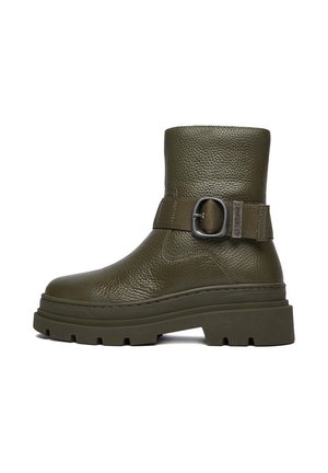 Green leather ankle boot with round buckle strap, chunky sole, and textured finish, viewed from the side.