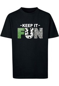 Black cotton t-shirt featuring bold text "KEEP IT FUN" with colorful graphic elements: green field, soccer ball, and doodle patterns.