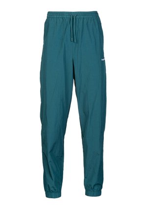 Jogger leggeri di colore teal con vita elastica e cordoncino. Include polsini elastici alle caviglie e un branding discreto sul lato.