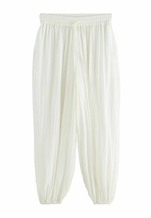 Lahtised valged püksid elastse vöökohaga ja paeltega koondatud elastsete säärega, valmistatud kergest, veidi tekstureeritud kangast.