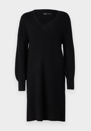 Abito nero a maglia con scollo a V, maniche lunghe a palloncino e polsini a coste. Il design è dritto e presenta un tessuto strutturato.