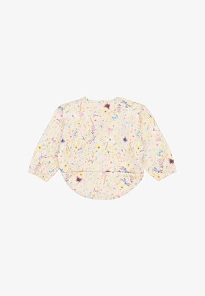 Õrnast kollasest kangast lillemustriga pikkade varrukatega pluus. Omadusteks ümardatud alumine äär, kogutud varrukad ning mitmevärviline lillemuster koos liblikatega.