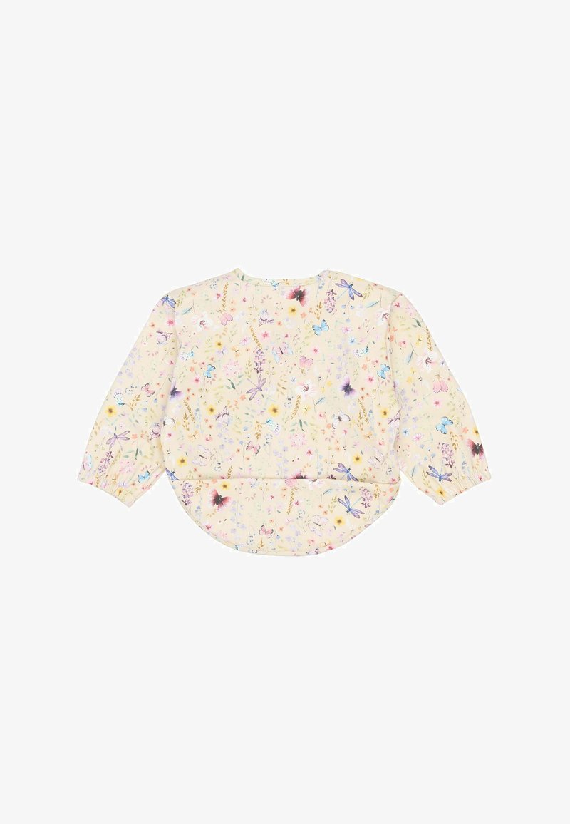 Dlhý rukáv s kvetinovým vzorom na mäkkej žltej látke. Má zaoblený lem, nariasené rukávy a pestrofarebný kvetinový vzor s motýľmi.