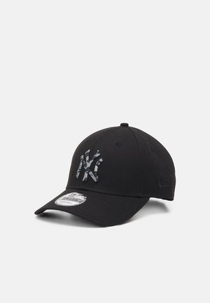Black adjustable baseball cap with camouflage-patterned NY logo embroidered on front and brand logo stitched on side.