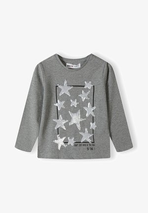 Gray cotton long-sleeve shirt featuring silver sequin stars arranged in a rectangular pattern, with a text design below.
