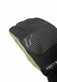 Black and green glove featuring a textured grip on the fingers, a smooth palm, and the word "SOFTS" printed on the side.