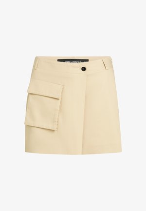 Vaalean beige hame, jossa on muotoiltu vyötärö, etupainonappi ja tavarapussi vasemmalla puolella. Sujuva kangas, jossa on räätälöity muotoilu.