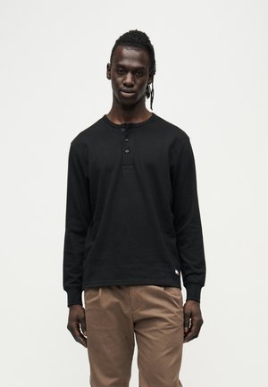 Tommy Jeans WAFFLE KNIT LONG SLEEVE HENLEY T-SHIRT - Maglietta a manica lunga - black